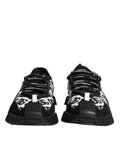 Chaussures sneakers basses noires Dolce & Gabbana avec logo, lacets et design élégant, vue de face.