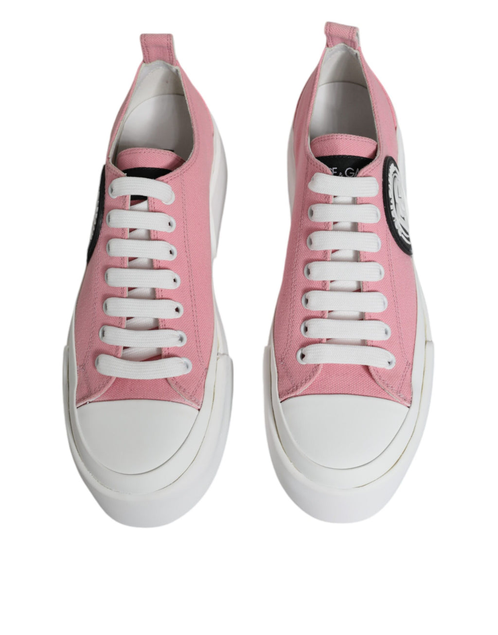 Chaussures basses Dolce & Gabbana en toile rose et blanche avec logo, style sneaker décontracté.
