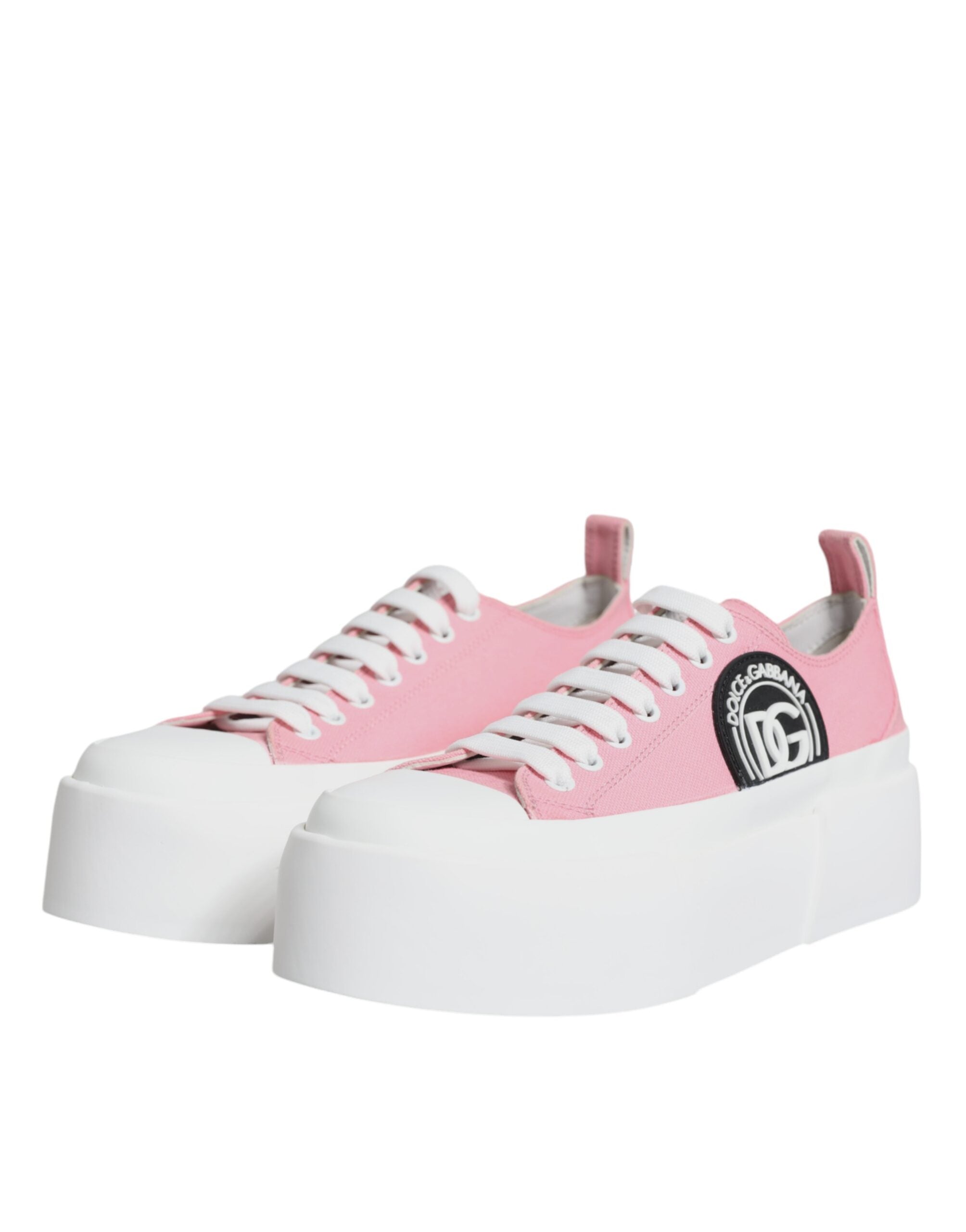 Chaussures de sneakers basses Dolce & Gabbana en toile rose et blanche avec logo, vue de côté.