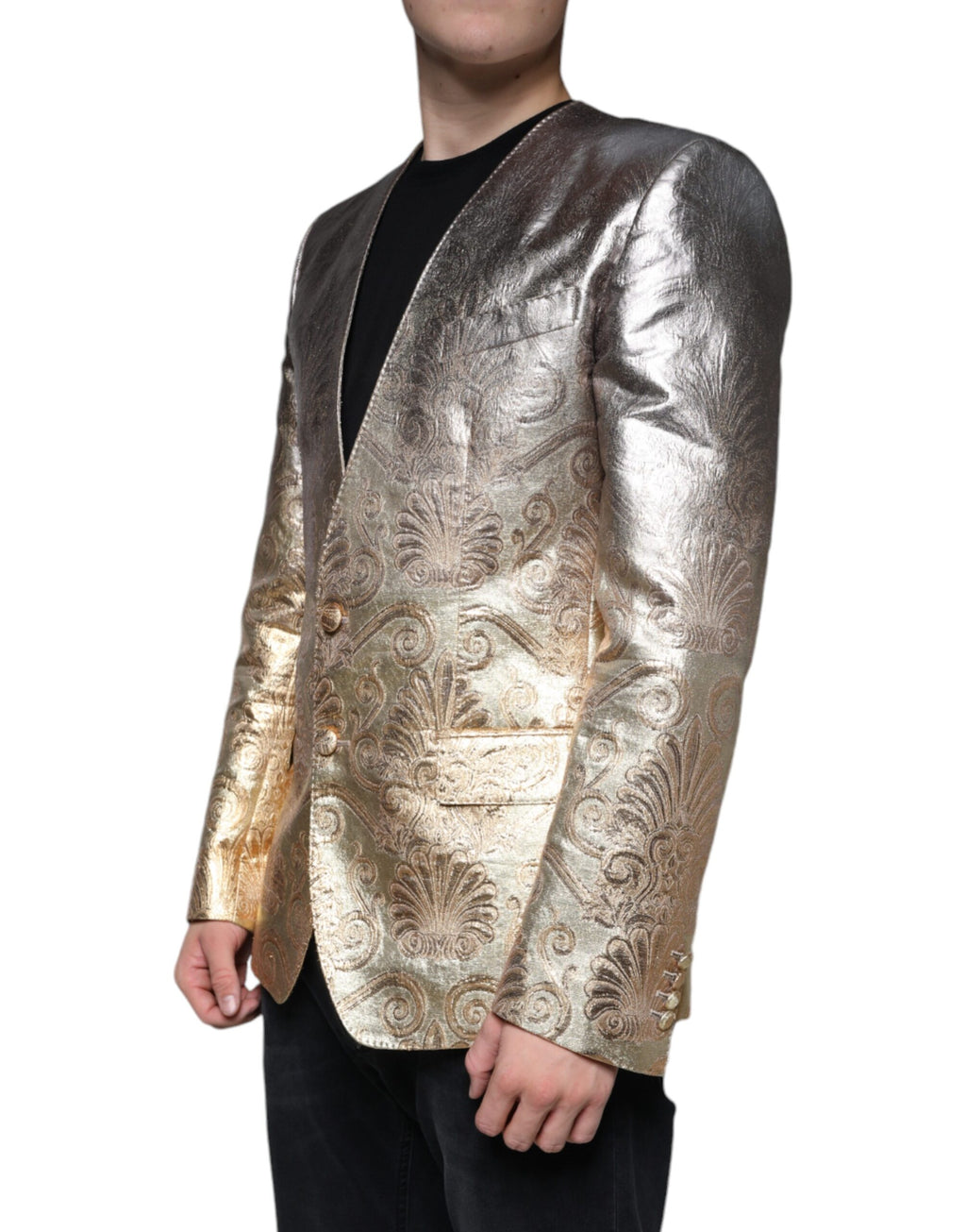 Veste blazer en jacquard doré à simple boutonnage de Dolce & Gabbana, élégante et sophistiquée, visible en gros plan.