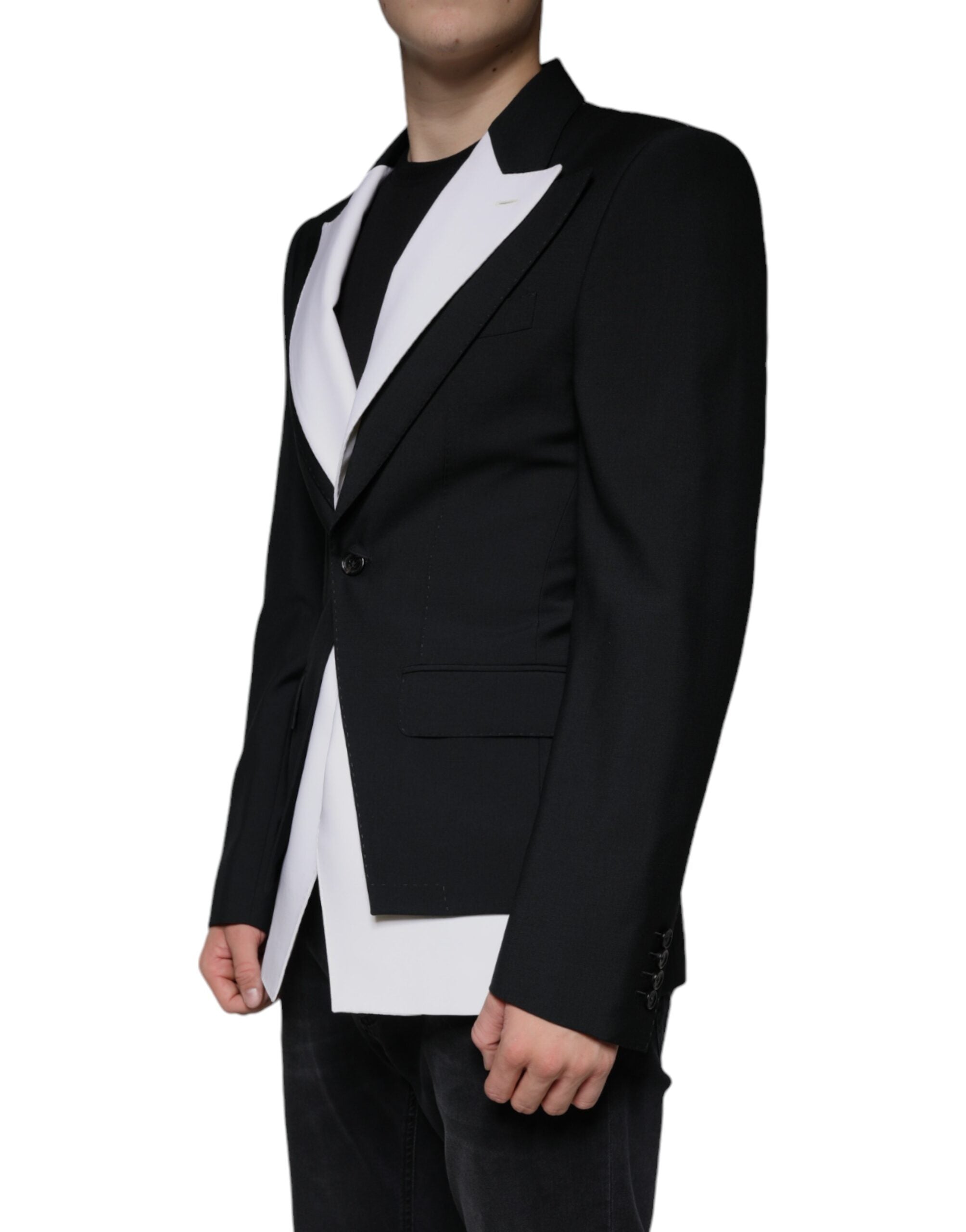 Veste blazer noire et blanche à un seul boutonnage de Dolce & Gabbana, élégante et ajustée, vue de face.