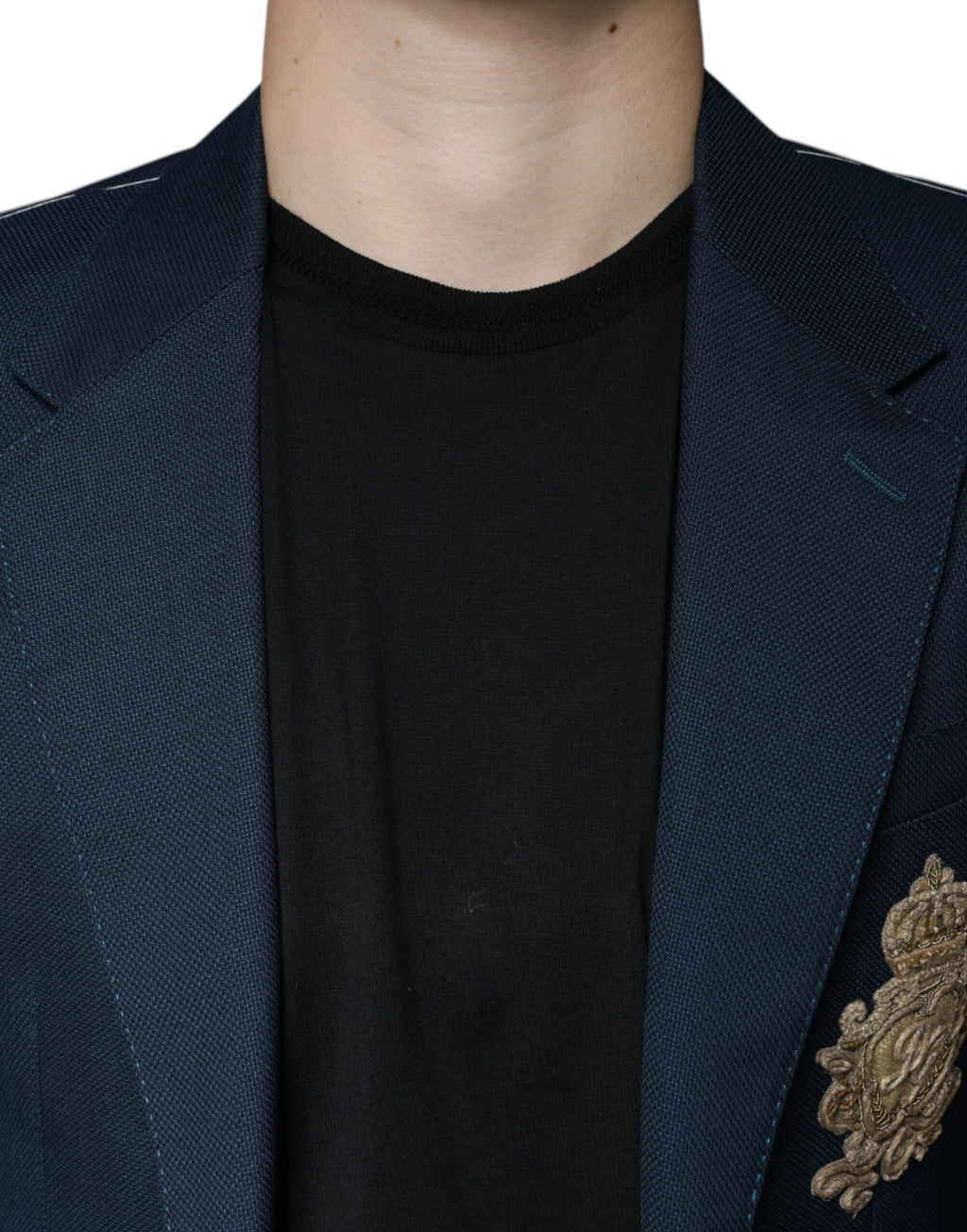 Manteau blazer bleu en laine à logo Dolce & Gabbana, coupe simple avec boutons devant, style élégant et sophistiqué.