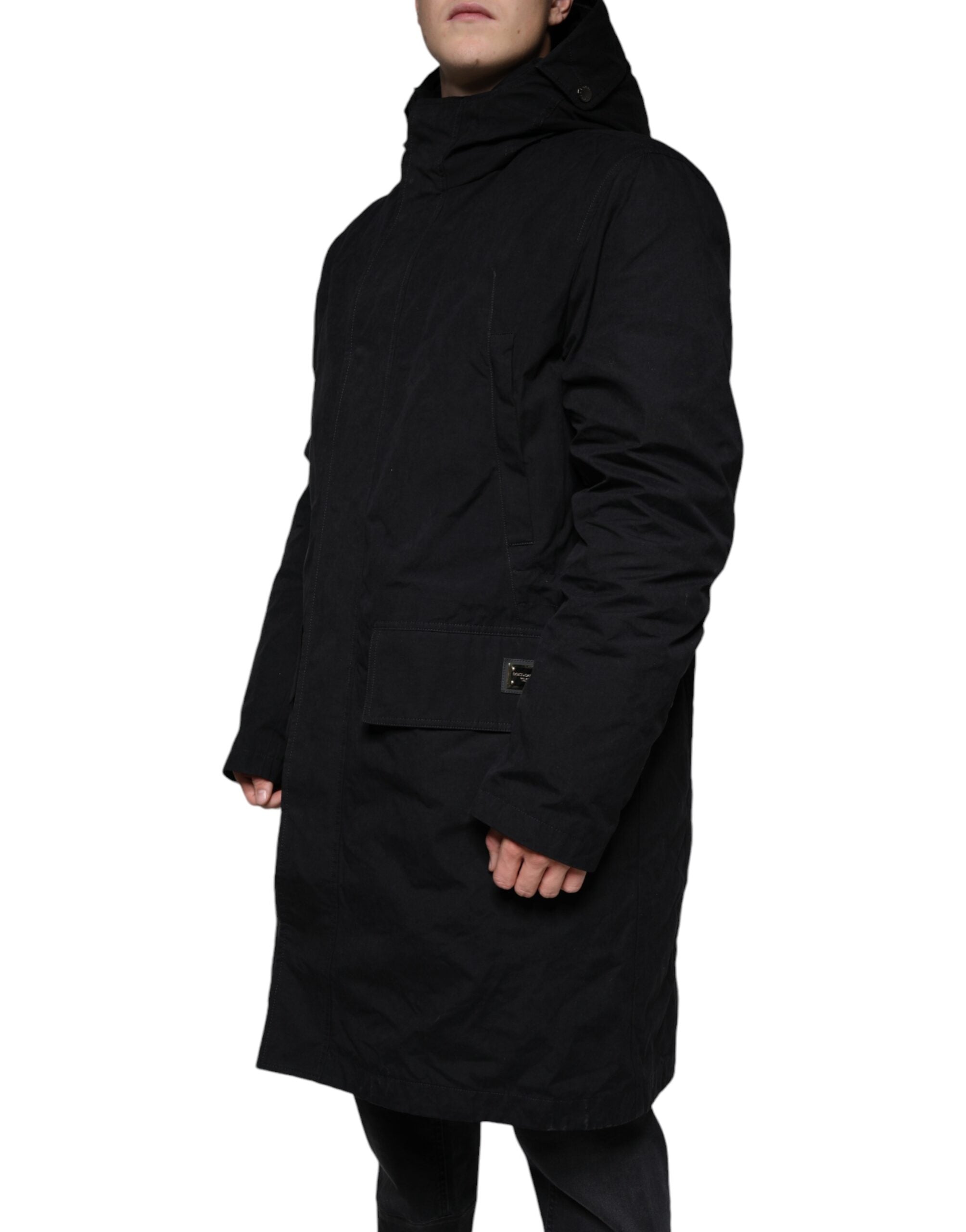 Imperméable noir Dolce & Gabbana à capuche, trench en coton avec fermeture et détails élégants, vue de face.