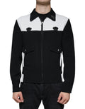 Veste zip complète Dolce & Gabbana noire et blanche avec couronne DG, style blouson, visible sur l'image.