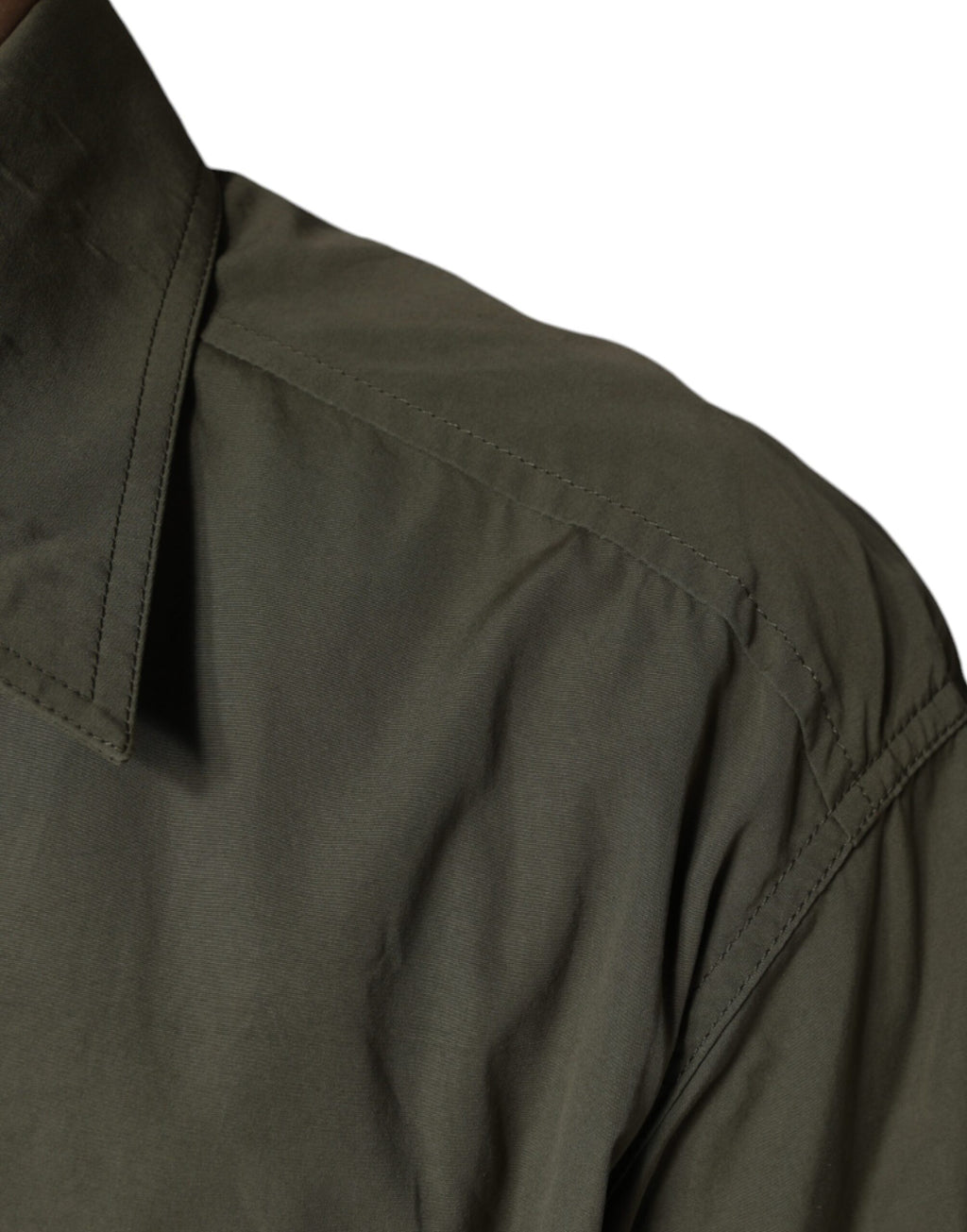 Veste militaire en coton vert olive de Dolce & Gabbana avec col boutonnière, style élégant et moderne.