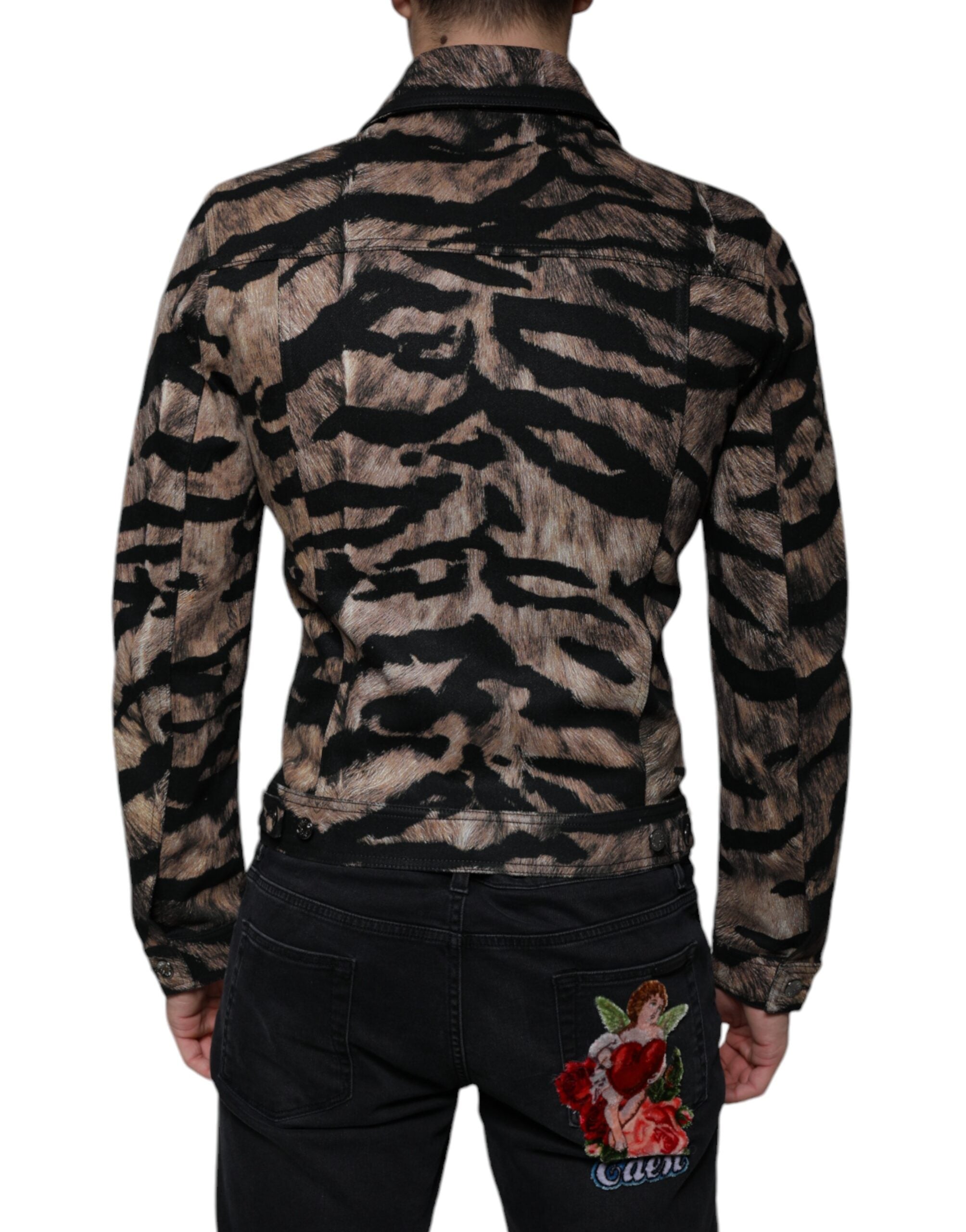Veste marron à boutons avec col, motif tigre, de la marque Dolce & Gabbana, visible sur l'image.