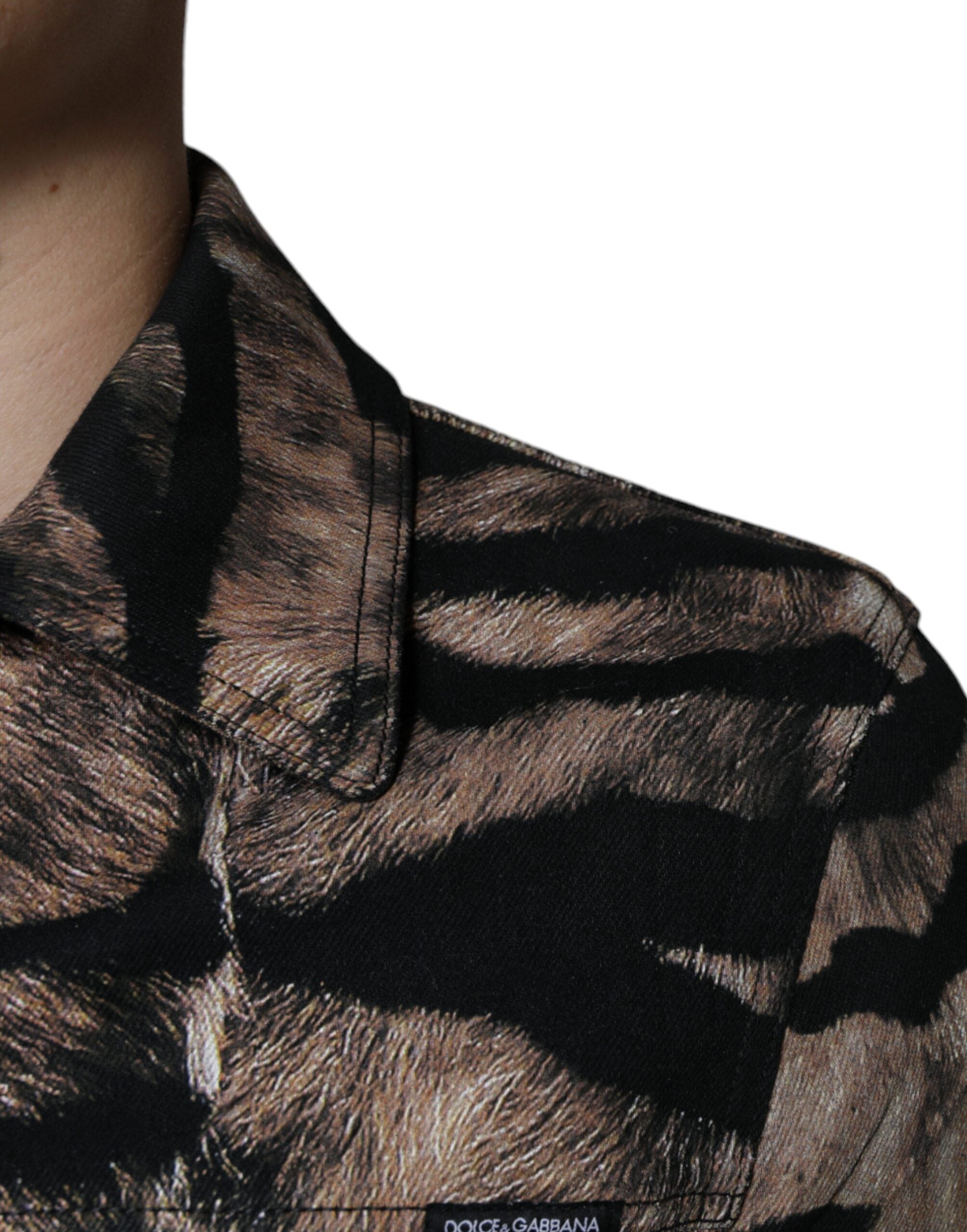 Veste à manches longues Dolce & Gabbana marron avec motif tigre, col à boutons et design élégant.