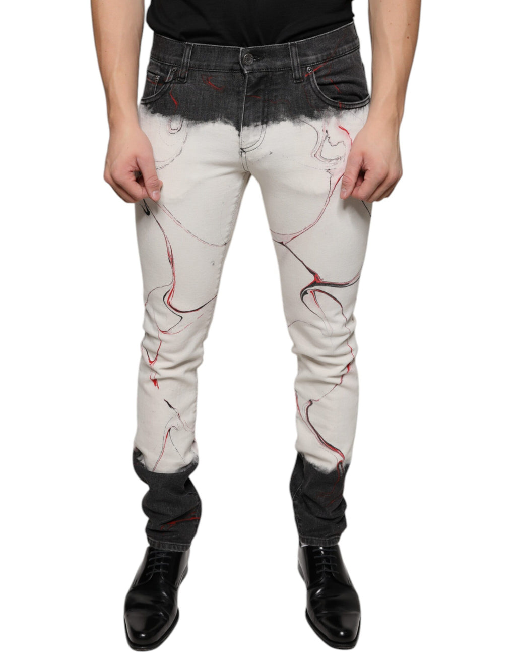 Jeans slim homme Dolce & Gabbana en denim noir et blanc à motif imprimé, ajustés et tendance.