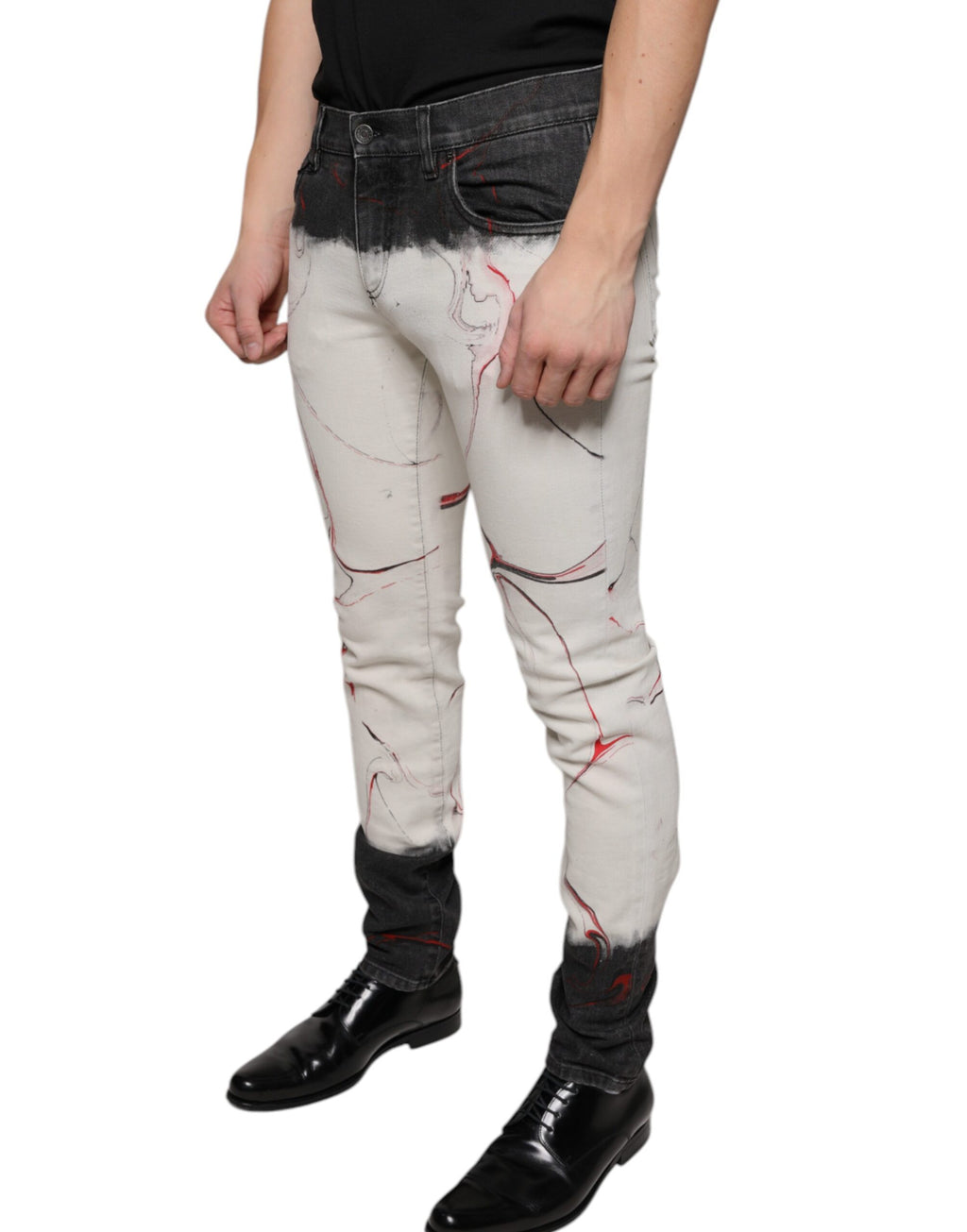 Jeans slim homme Dolce & Gabbana noirs et blancs à motif imprimé, en denim ajusté et tendance.