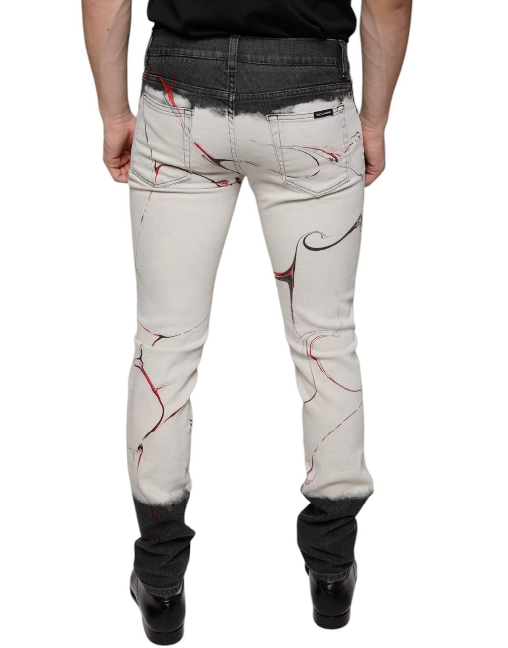 Jeans slim homme Dolce & Gabbana en denim noir et blanc à motifs, ajustés et tendance.