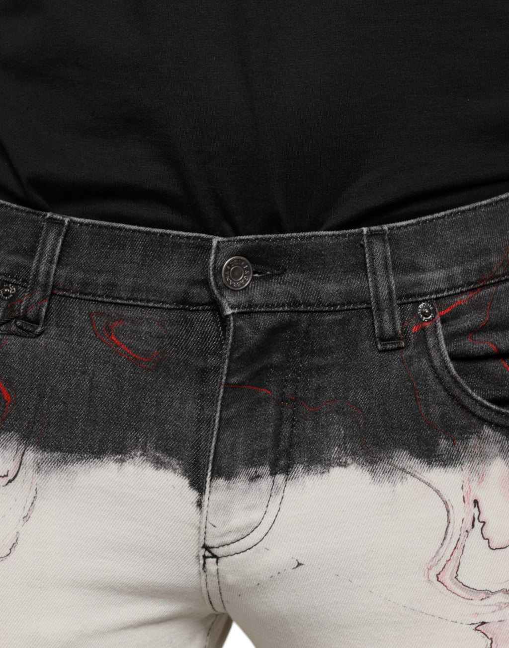 Jeans slim en denim noir et blanc imprimé pour homme de Dolce & Gabbana, style moderne et ajusté.