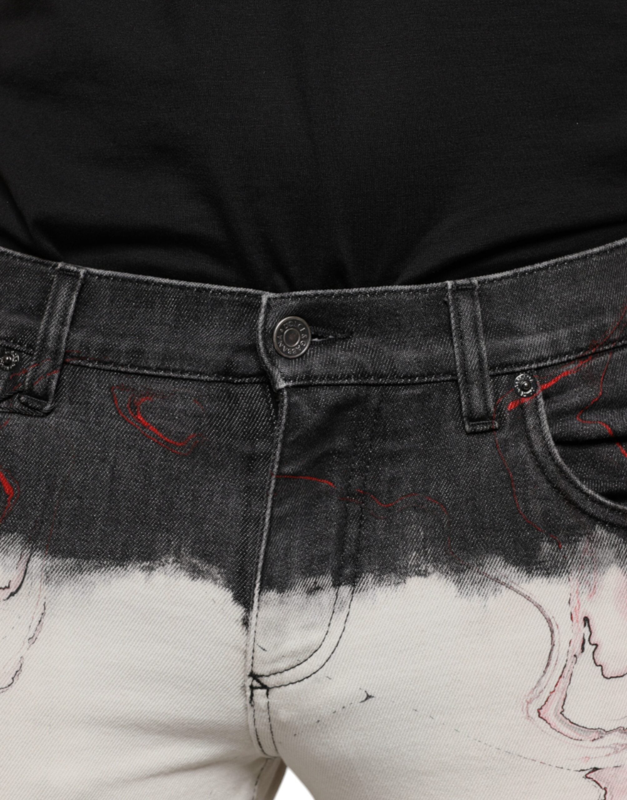 Jeans slim en denim noir et blanc imprimé pour homme de Dolce & Gabbana, style moderne et ajusté.