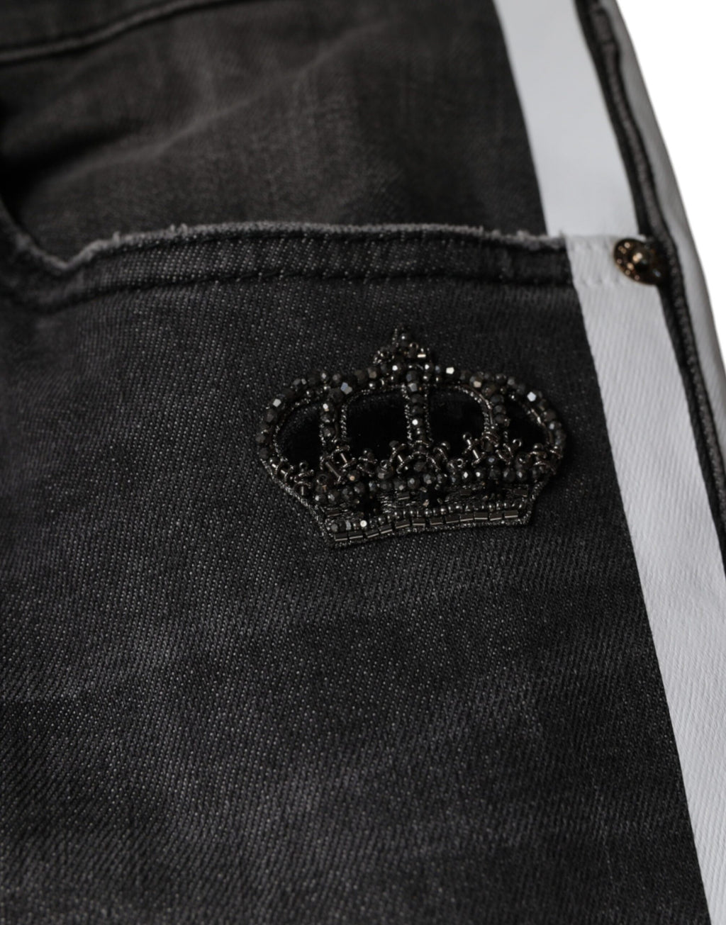 Jeans homme skinny en denim noir tissé déchiré de Dolce & Gabbana, coton, style décontracté et tendance.