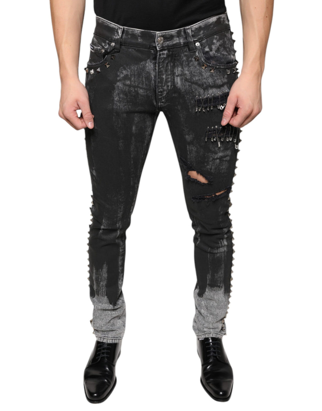 Jeans skinny en denim coton noir Dolce & Gabbana avec embellissements, vue de face.