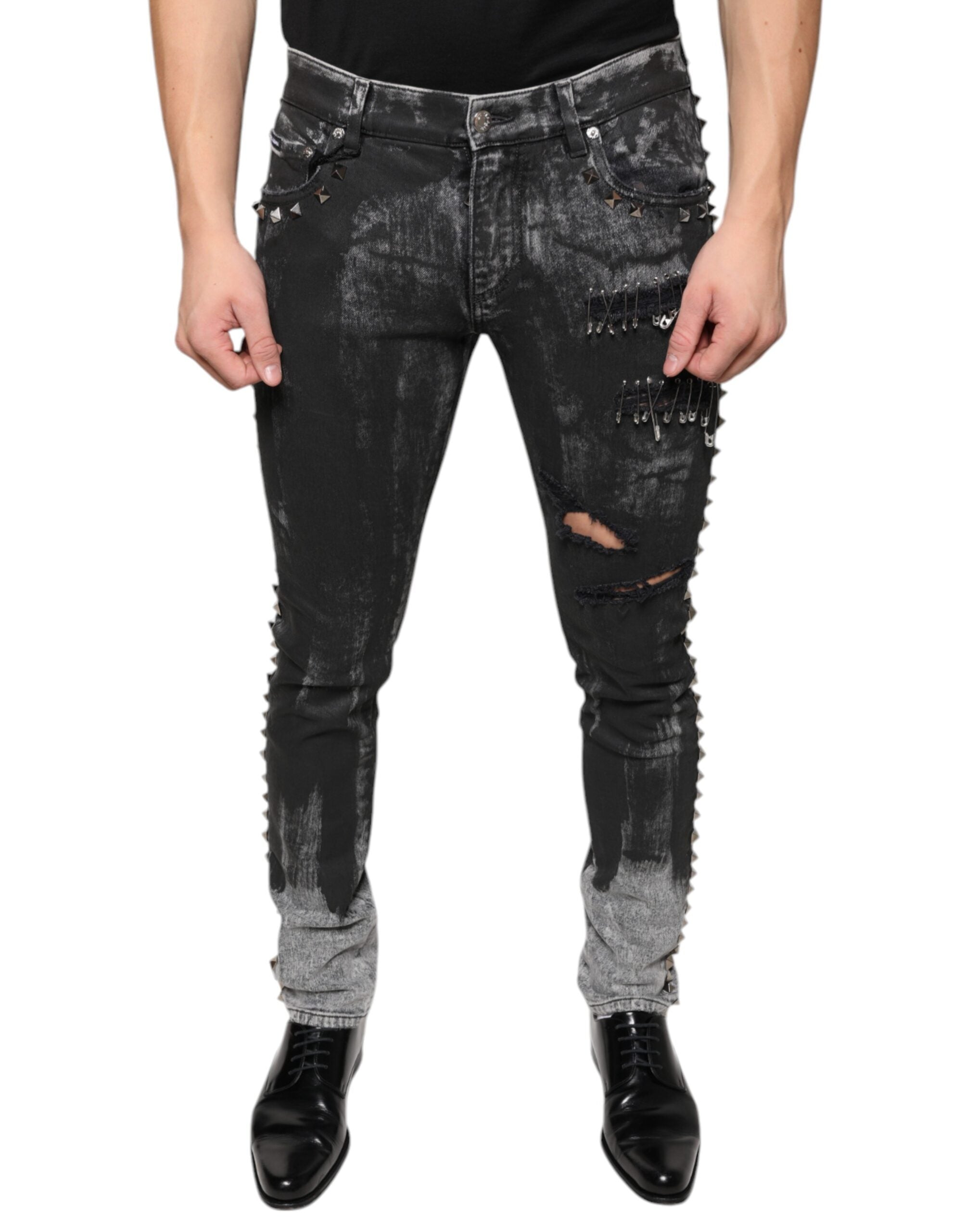 Jeans skinny en coton noir Dolce & Gabbana avec embellissements, vue de face, détails de la couture et style élégant.