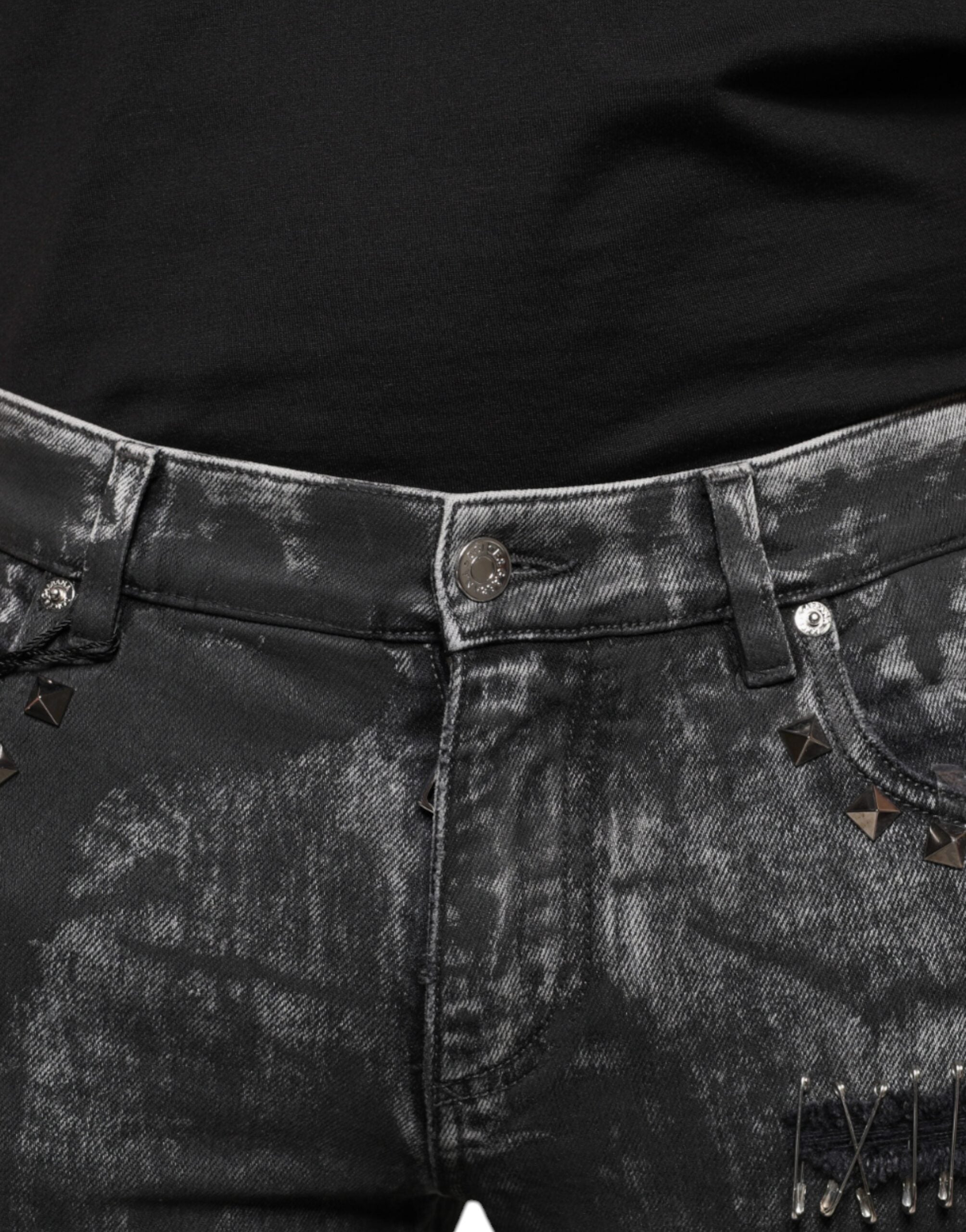 Jeans skinny en denim noir Dolce & Gabbana avec embellissements en coton, ajustés et élégants.