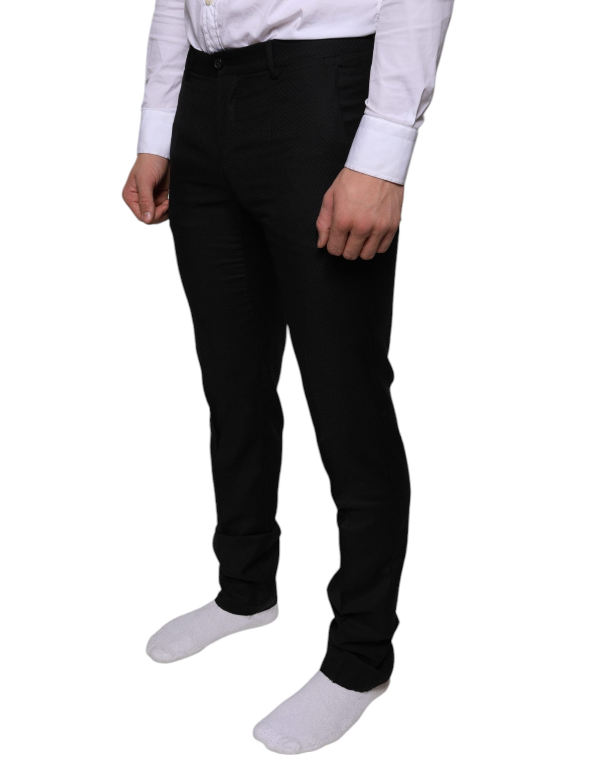 Pantalon skinny en laine noire Dolce & Gabbana, pantalon formel élégant pour femme, vue de devant sur fond blanc.