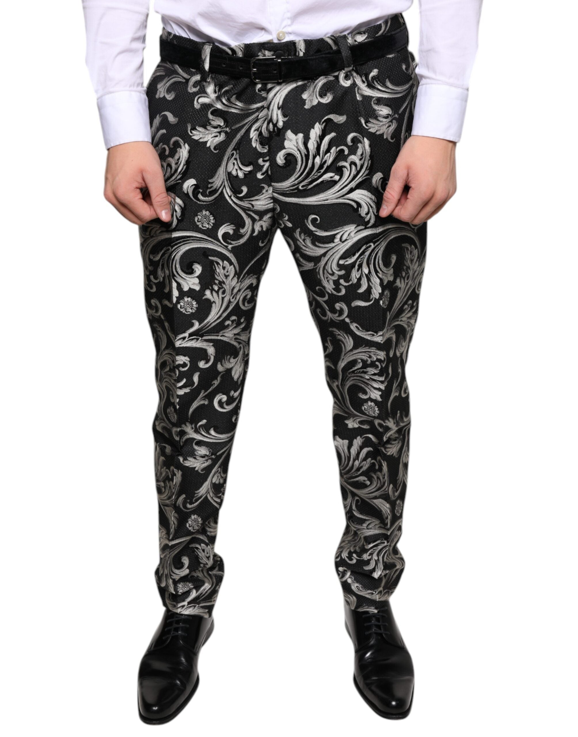 Pantalon skinny en jacquard noir de Dolce & Gabbana, style élégant et ajusté, vue de face sur fond blanc.