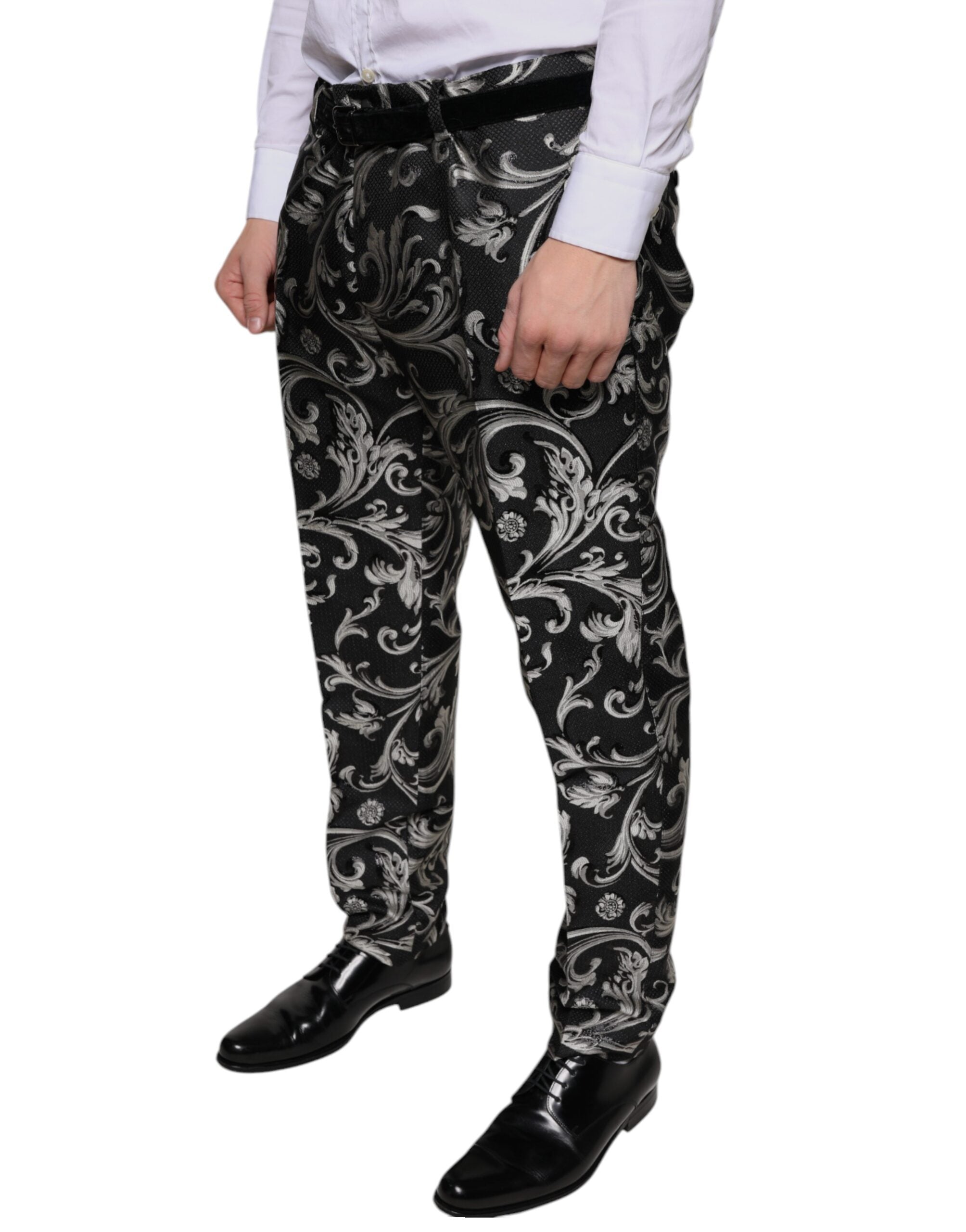Pantalon skinny en jacquard noir de Dolce & Gabbana, style élégant et ajusté, visible en détail dans cette image.