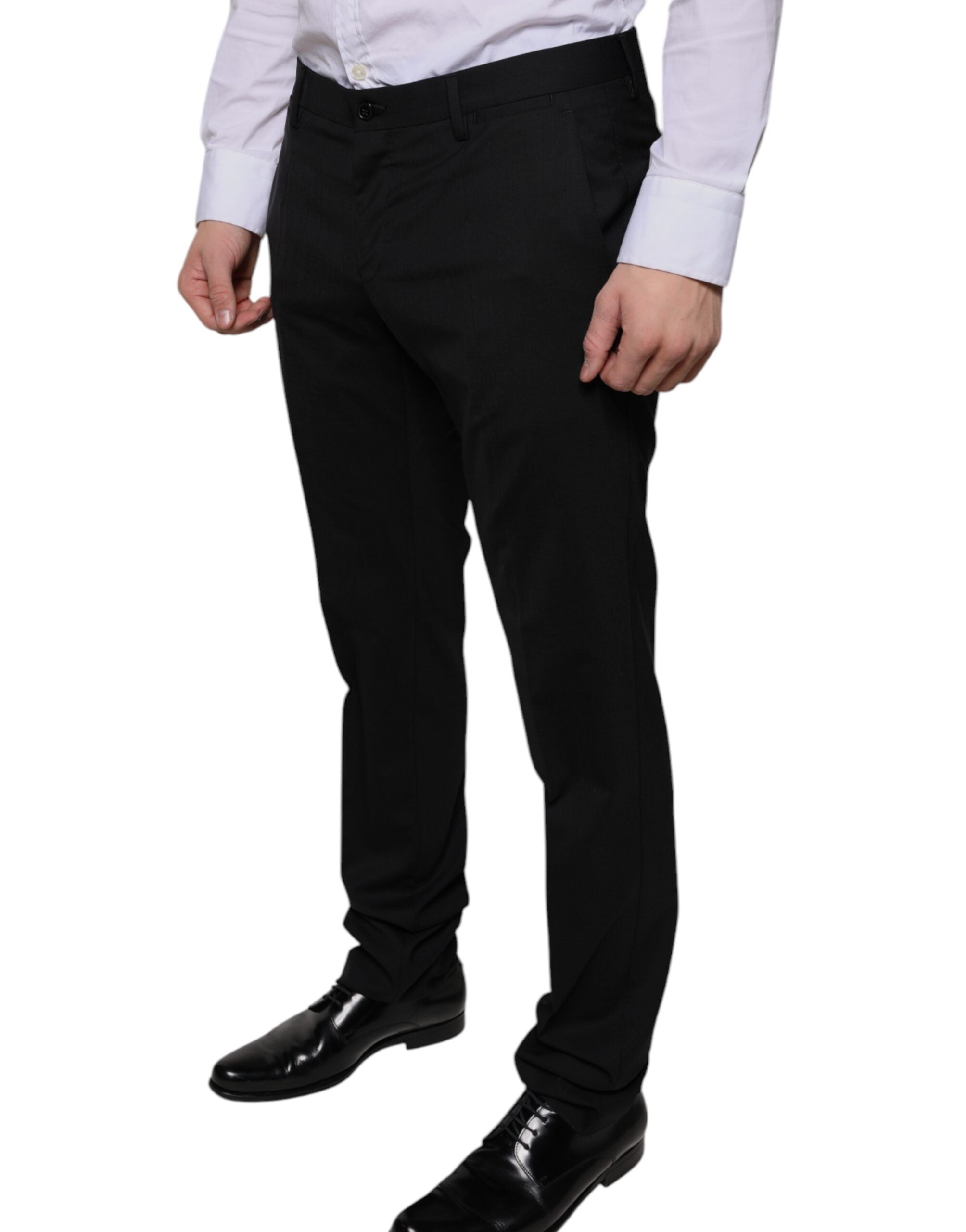 Pantalon formel en laine noire Dolce & Gabbana, coupe skinny, pour femme, vue de face sur fond blanc