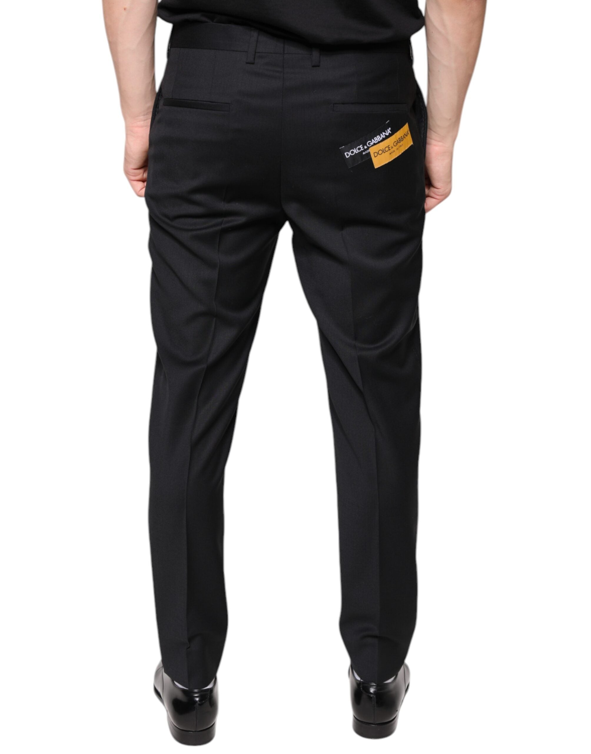 Pantalon homme skinny en laine noire de Dolce & Gabbana, pantalon de costume élégant et ajusté.
