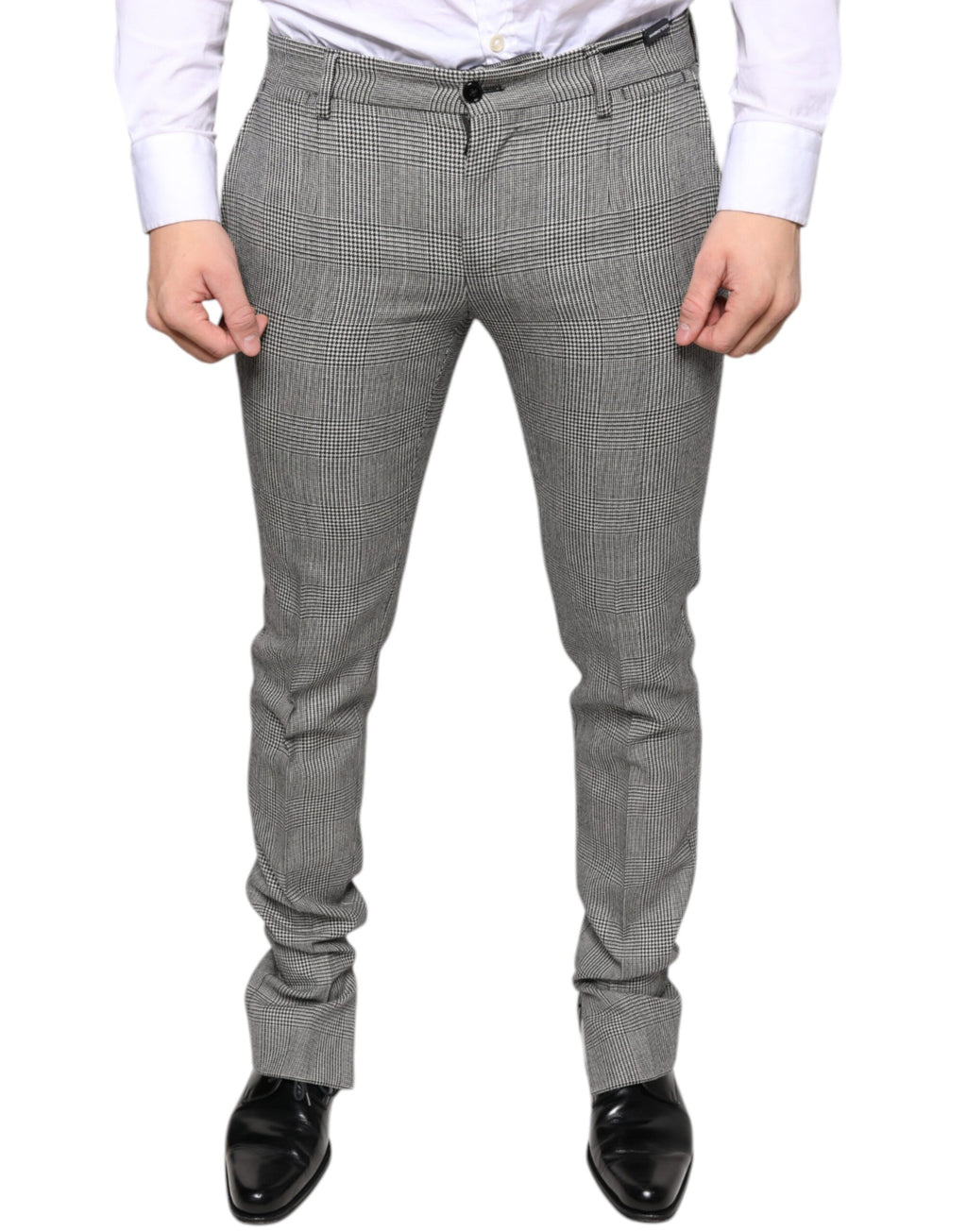 Pantalon skinny en laine à carreaux gris Dolce & Gabbana, style tartan, ajusté et élégant, vue de face sur mannequin.