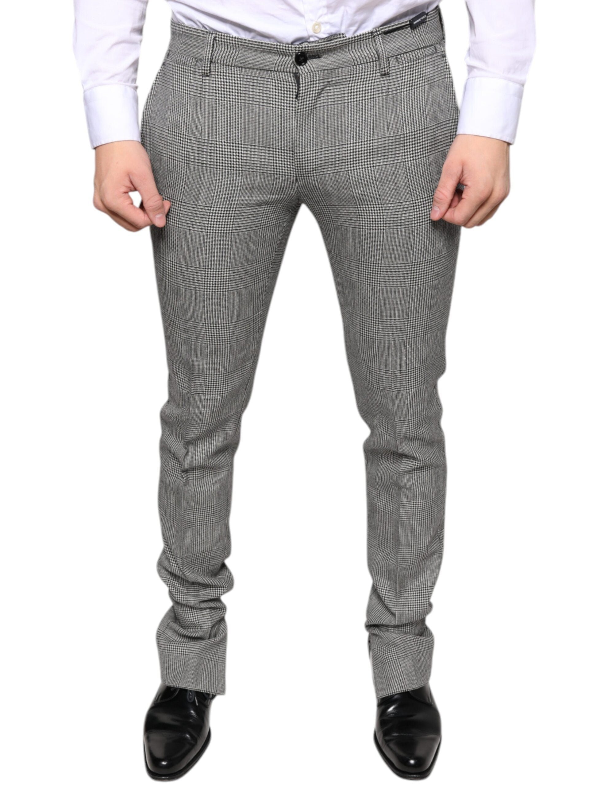 Pantalon skinny en laine à carreaux gris Dolce & Gabbana, style tartan, ajusté et élégant, vue de face sur mannequin.