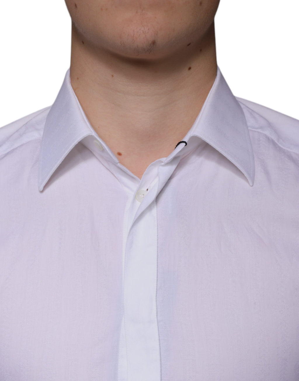 Chemise formelle blanche en coton pour homme Dolce & Gabbana, style élégant avec boutons dorés et col classique.