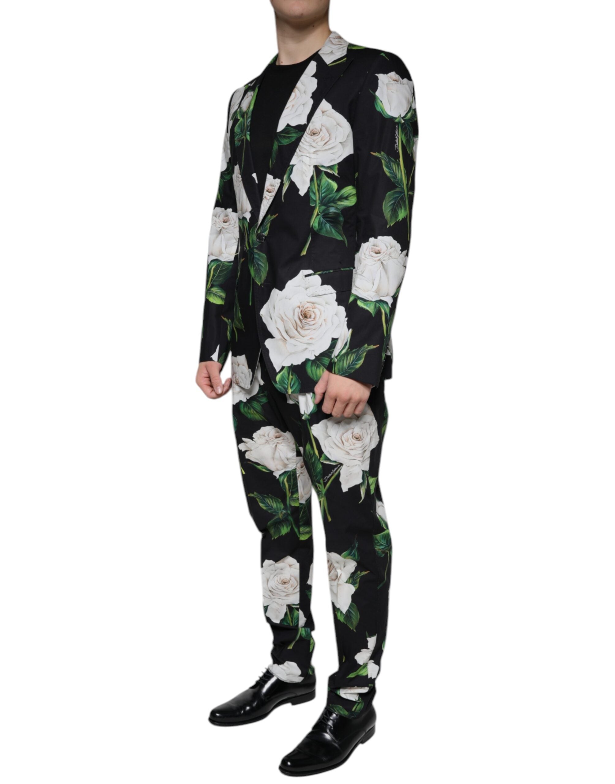 Costume homme formel Dolce & Gabbana en coton noir avec motif de rose, costume 2 pièces élégant et classique.