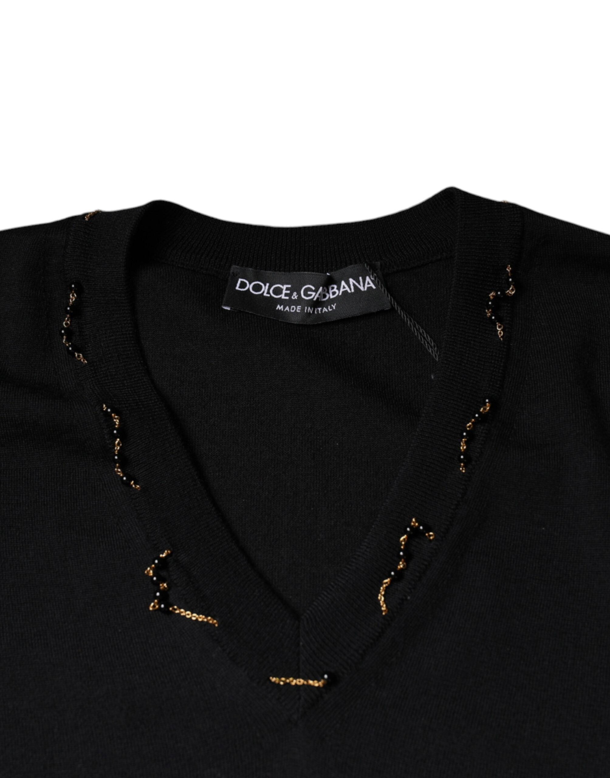 Pull-over noir Dolce & Gabbana à col en V orné de détails brillants et embellissements sophistiqués.
