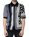 T-shirt polo Dolce & Gabbana à pois noirs et blancs avec col, en coton, porté sur mannequin.