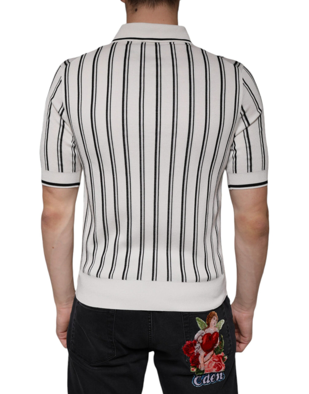 T-shirt polo à manches courtes Dolce & Gabbana blanc et noir avec rayures, design élégant et style classique.