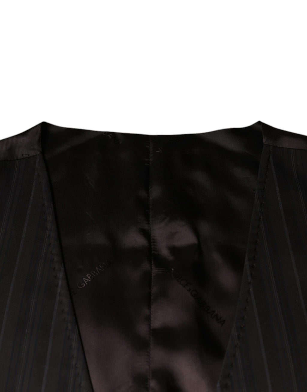 Gilet ajusté noir en coton de la marque Dolce & Gabbana, vêtement formel pour femme, vue de face.
