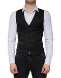 Gilet veste formel en laine noire de Dolce & Gabbana, coupe élégante et sophistiquée, parfait pour occasions habillées.