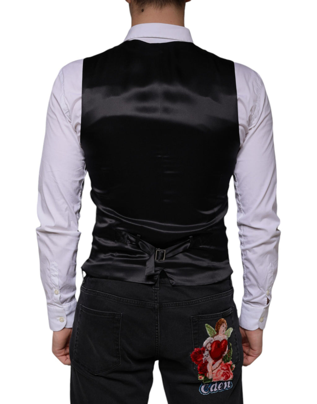 Gilet formel en laine noire Dolce & Gabbana, robe cintrée élégante pour occasions spéciales, détails sophistiqués.