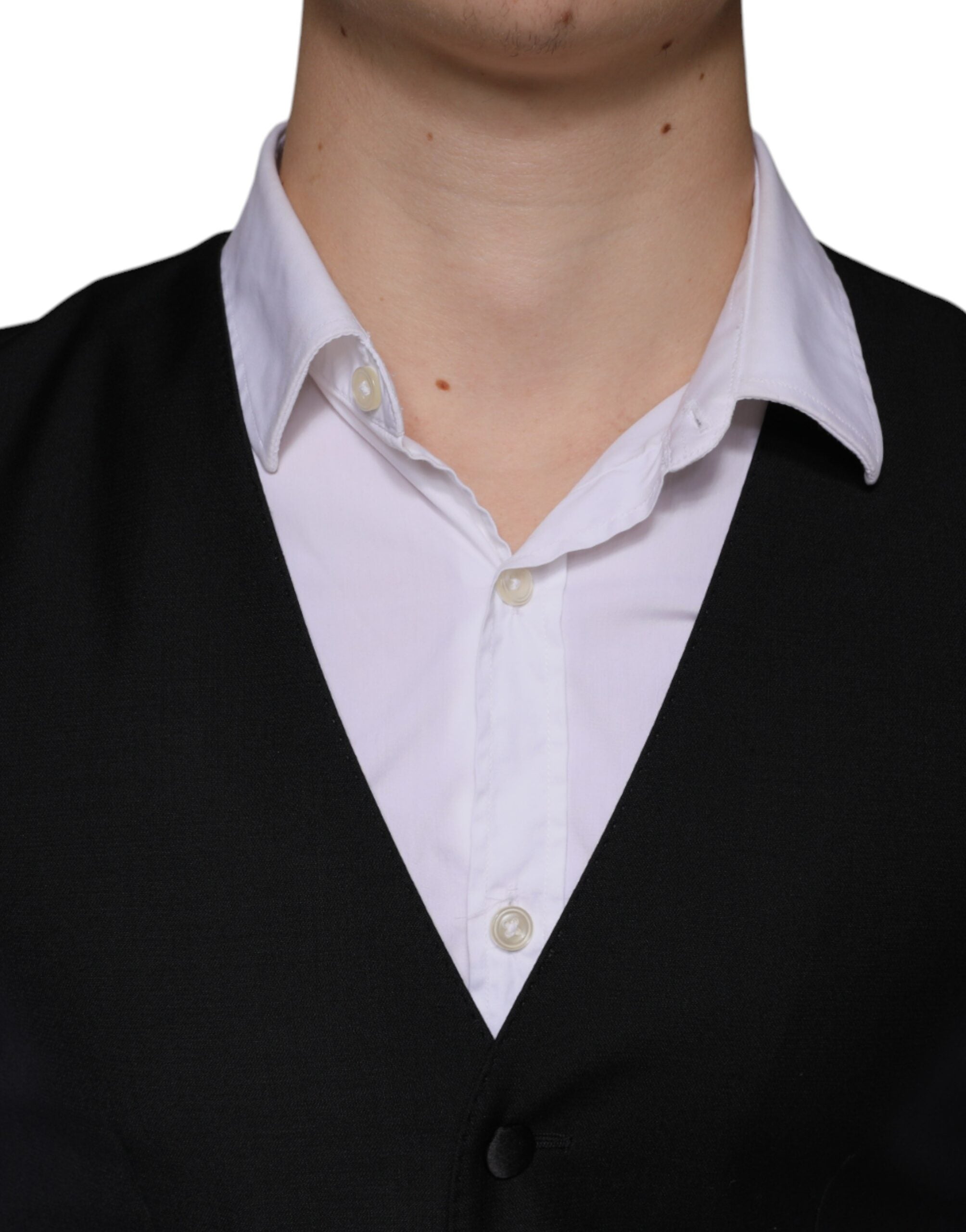 Robe de gownée Dolce & Gabbana en laine noire, veste formelle cintrée, design élégant et sophistiqué, portée comme robe ou veste.