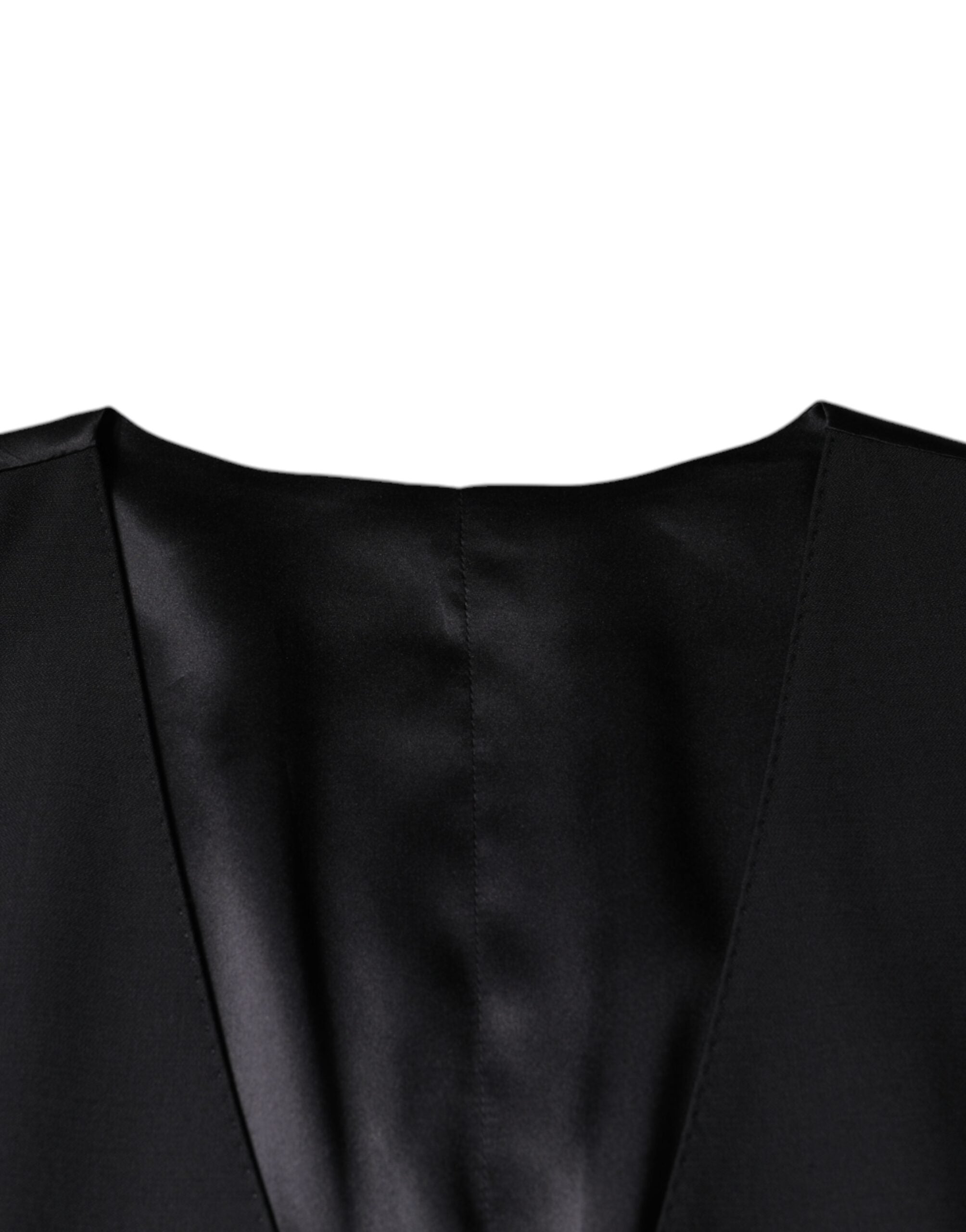 Robe-chemise noire en laine Dolce & Gabbana, veste cintrée élégante pour occasion formelle, détails sophistiqués.