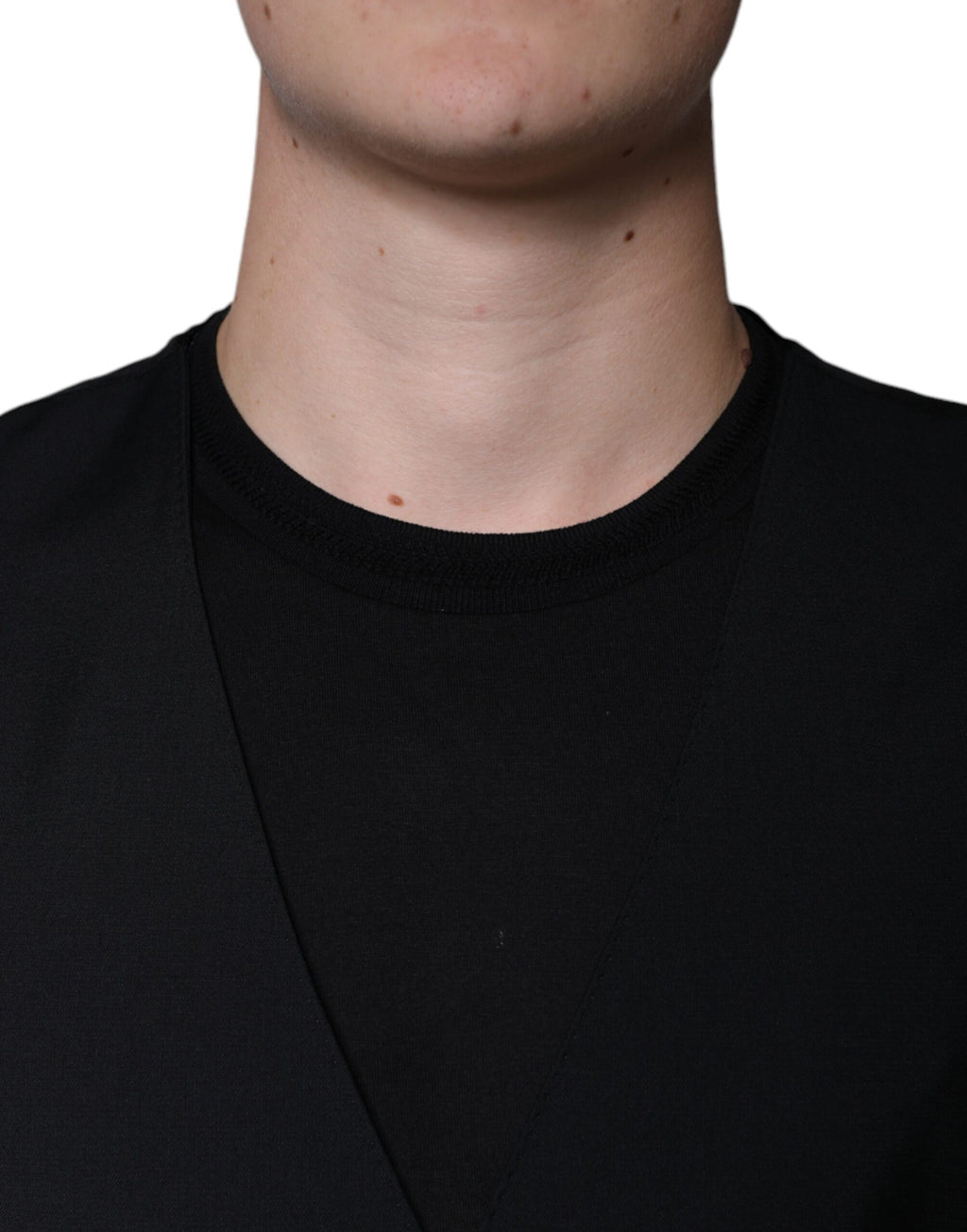 Gilet homme Dolce & Gabbana en laine noire pour costume formel, détail élégant et coupe ajustée.
