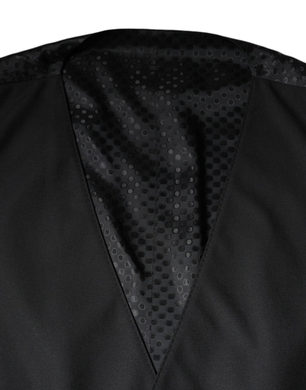 Gilet en laine noir Dolce & Gabbana, robe portefeuille élégante pour occasion formelle, détails en tissu de qualité.