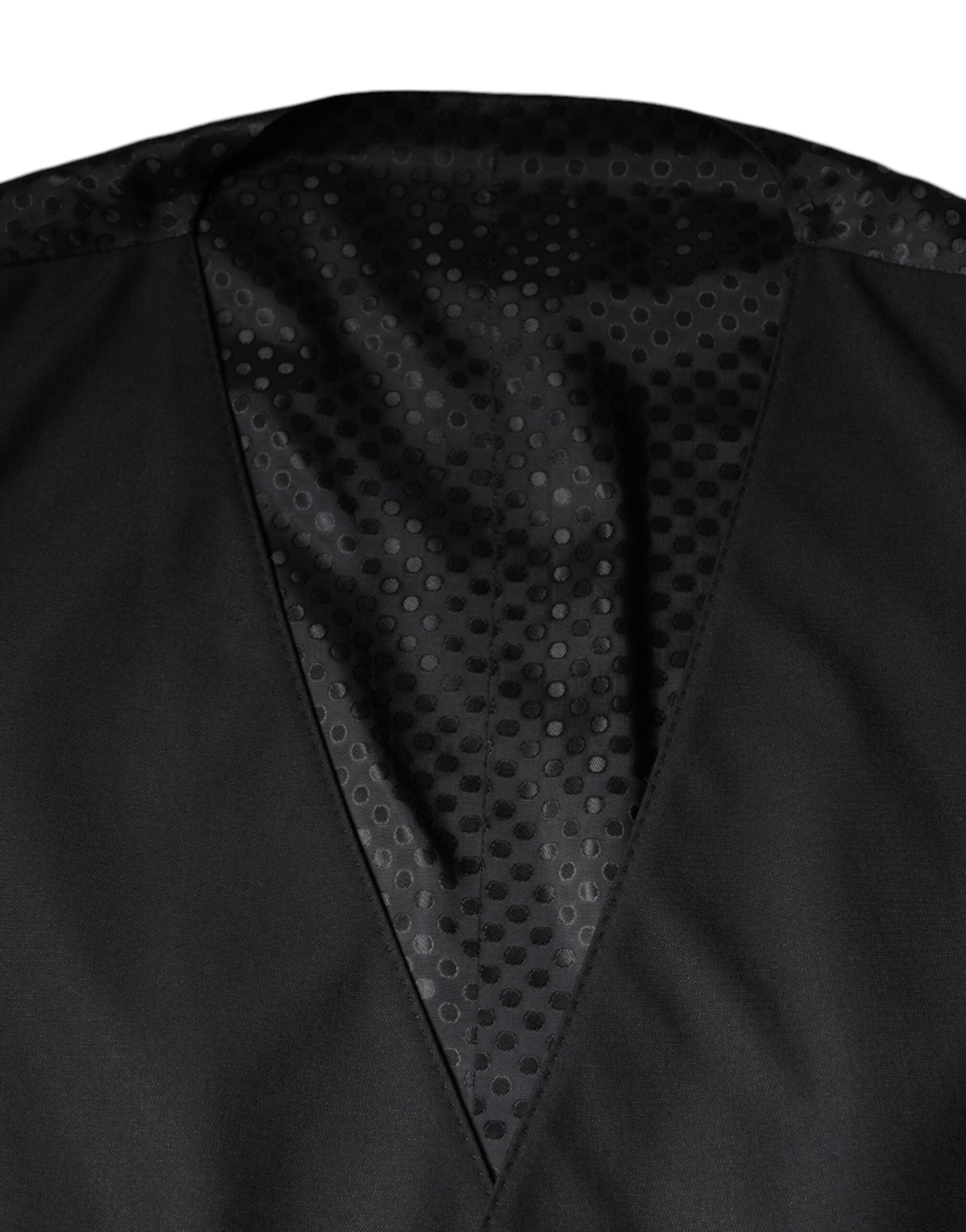 Gilet en laine noir Dolce & Gabbana, robe portefeuille élégante pour occasion formelle, détails en tissu de qualité.