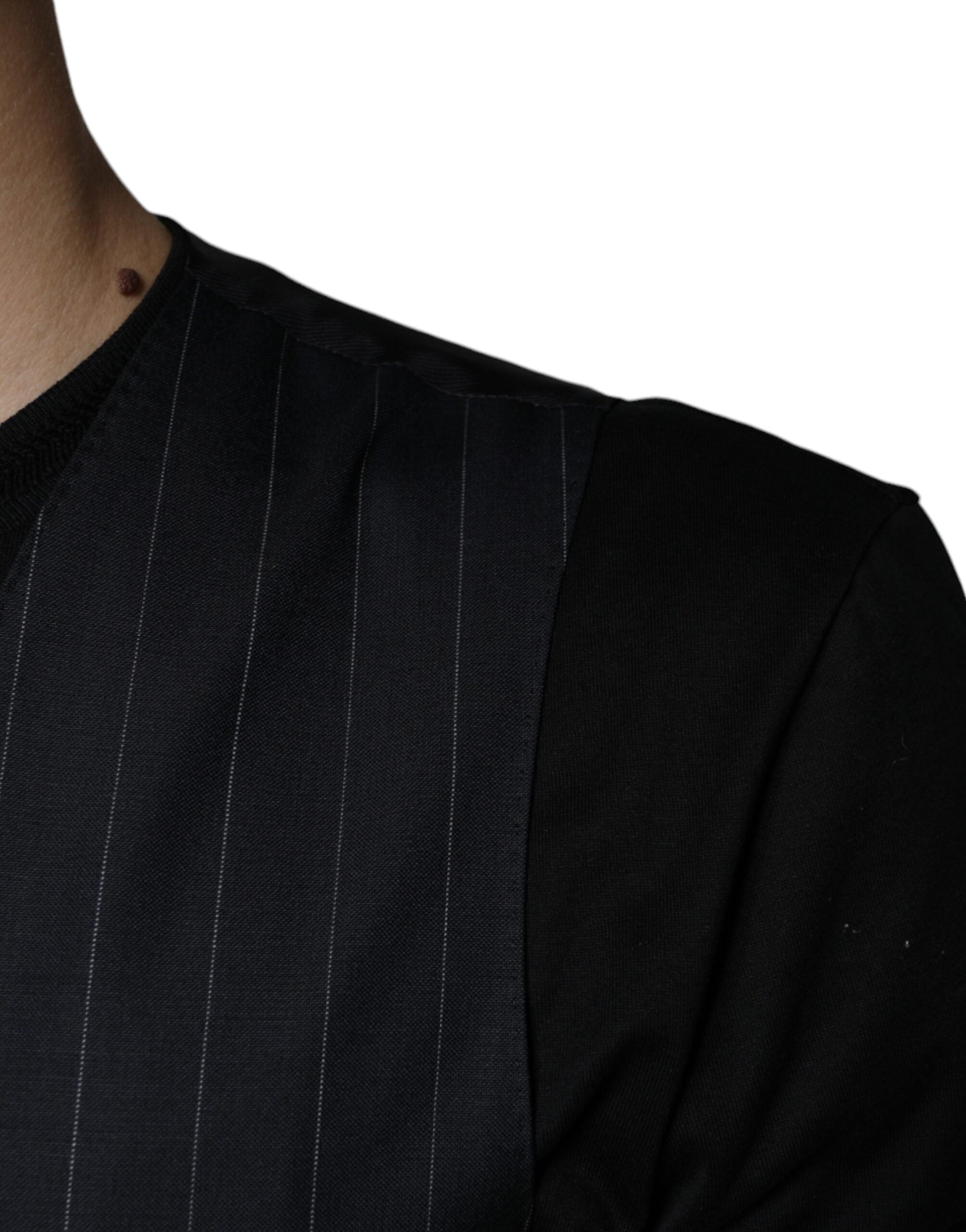 Gilet habillé en cuir noir de la marque Dolce & Gabbana, veste formelle pour femmes avec coupe élégante.