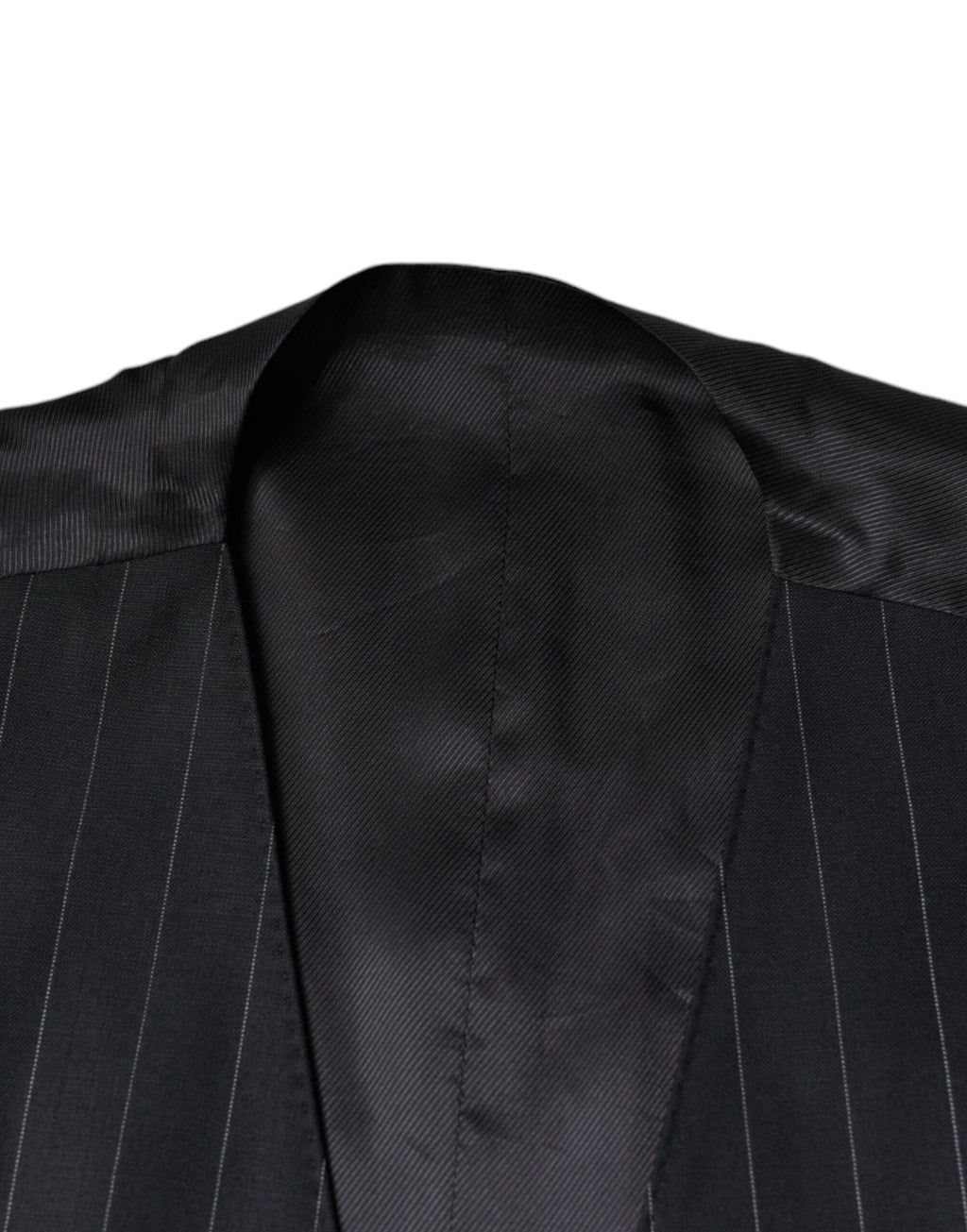 Gilet noir en cuir de la marque Dolce & Gabbana, veste formelle ajustée pour femme, vue de face.