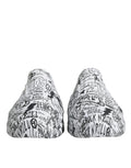 Chaussures sneakers Dolce & Gabbana Daymaster blanches et noires avec graffiti, style décontracté et tendance.
