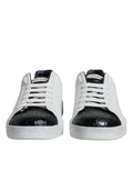 Chaussures sneakers Portofino en cuir blanc Dolce & Gabbana avec logo, vue de face sur une surface blanche.