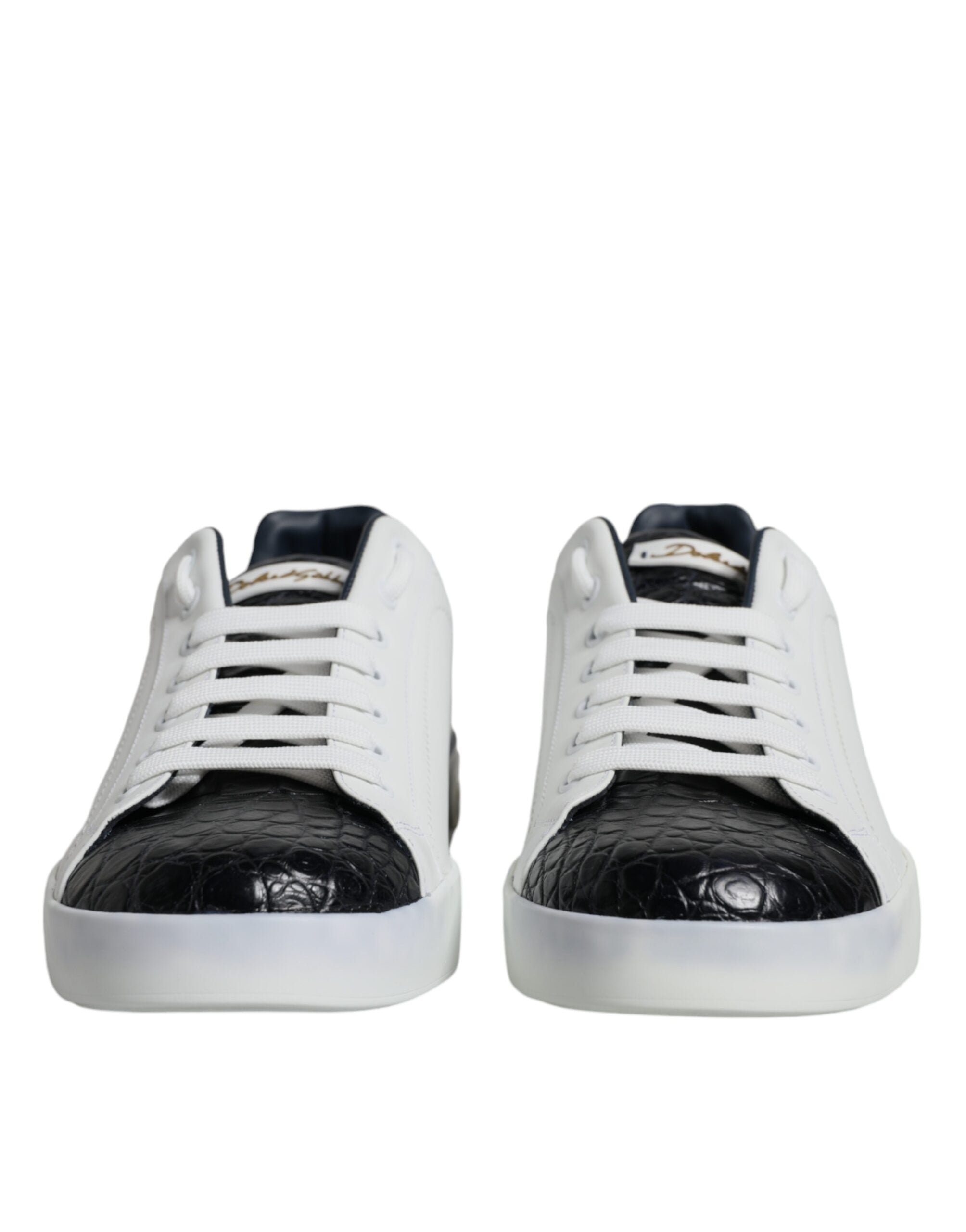 Chaussures sneakers Portofino en cuir blanc Dolce & Gabbana avec logo, vue de face sur une surface blanche.