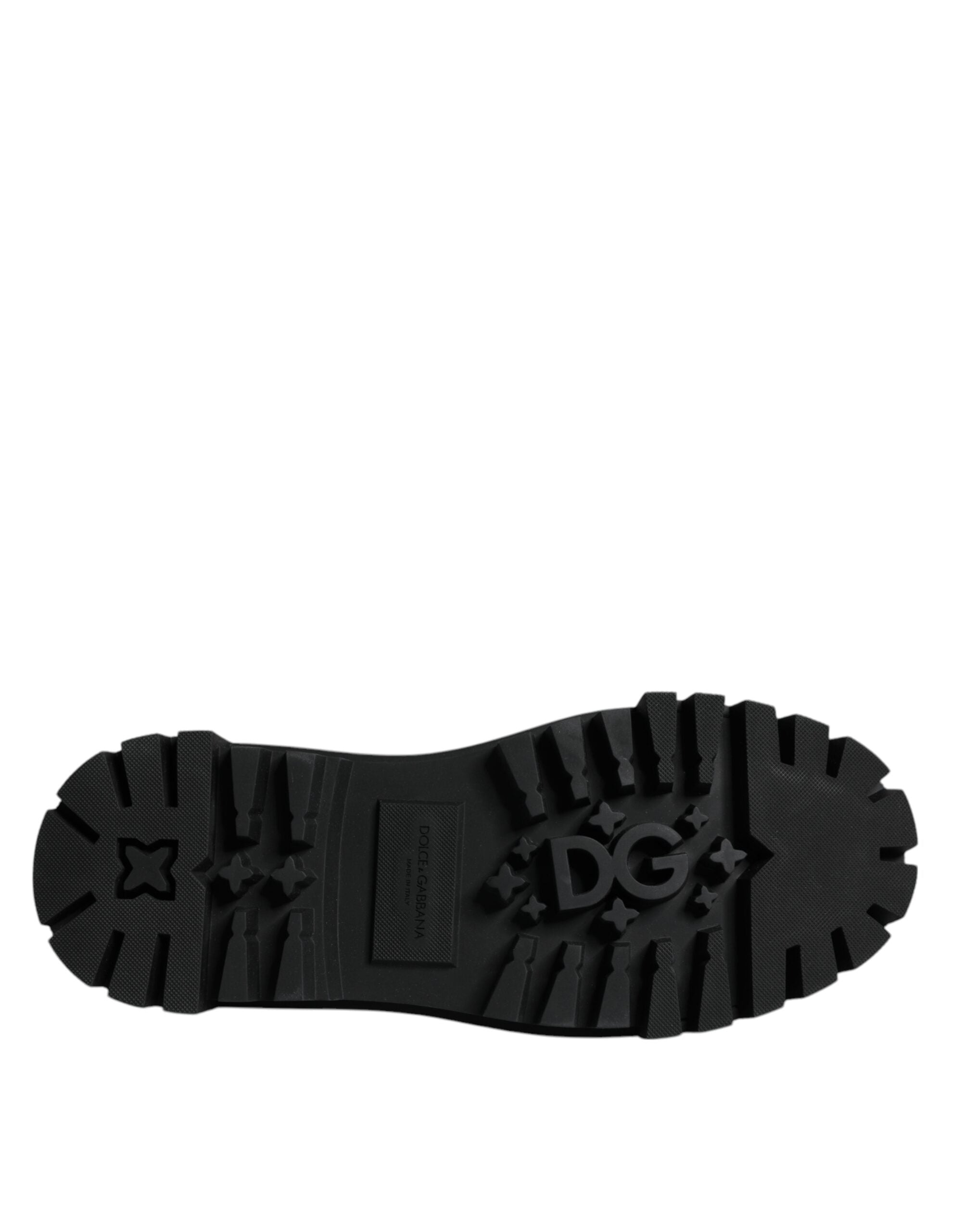 Chaussures de trekking en cuir noir Dolce & Gabbana avec lacets, style élégant et robuste, vue de face.
