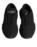 Chaussures sneakers noires Dolce & Gabbana Daymaster en tricot, vue de face avec détails en tissu et semelle blanche.