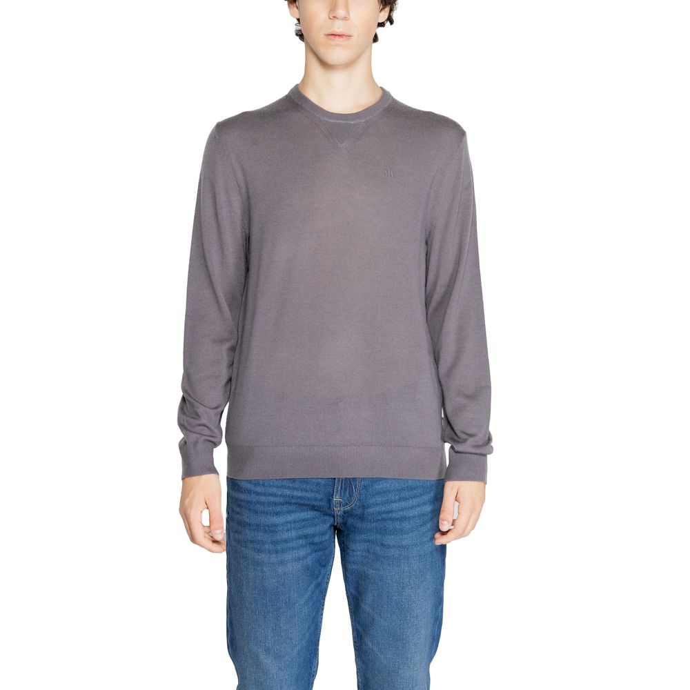 Sweatshirt gris en laine Armani Exchange, vue de face, avec col rond et logo discret sur la poitrine.