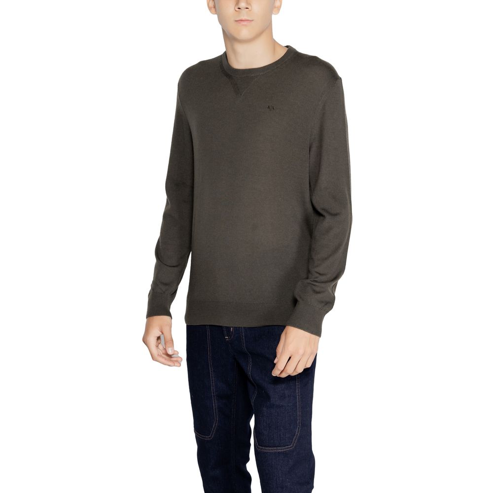 Sweatshirt en laine verte Armani Exchange, coupe décontractée avec logo sur la poitrine, vue de face.