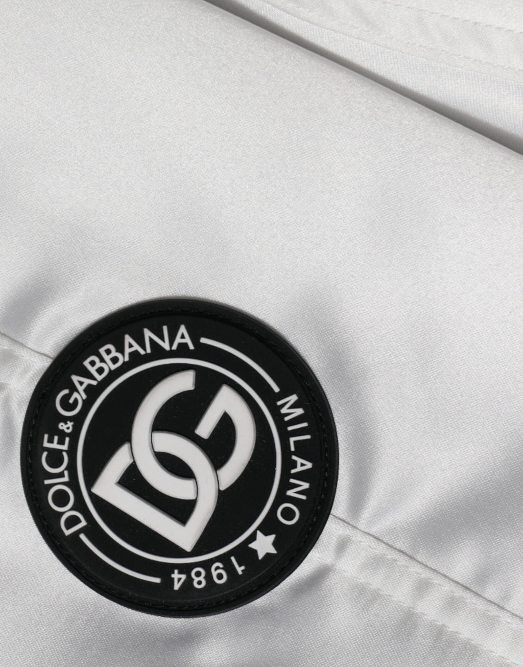 Veste bomber blanche en polyester Dolce & Gabbana avec logo, zip complet, style moderne et élégant.
